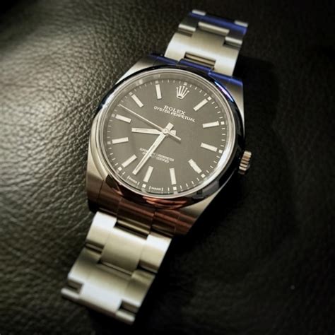 rolex oyster perpetual 39 black dial review